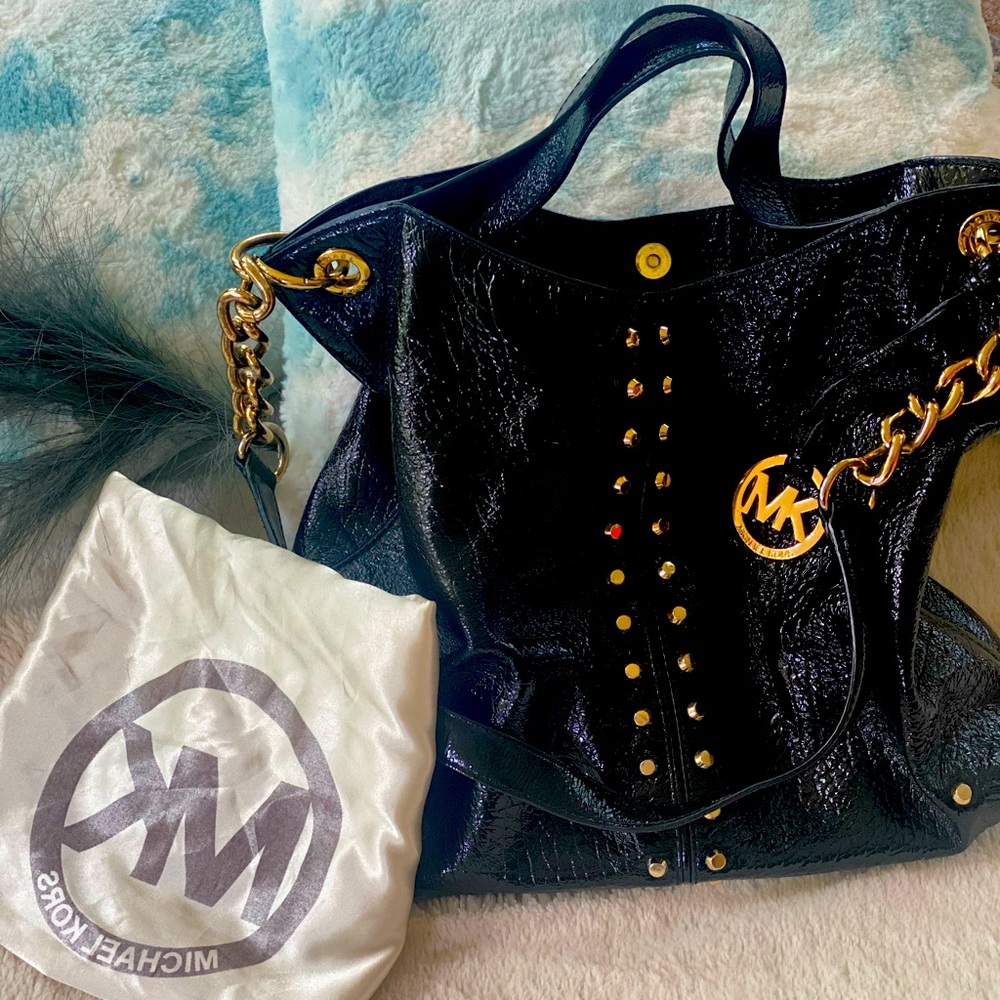 Well-loved and still beautiful MICHAEL KORS black leather, gold embellishments